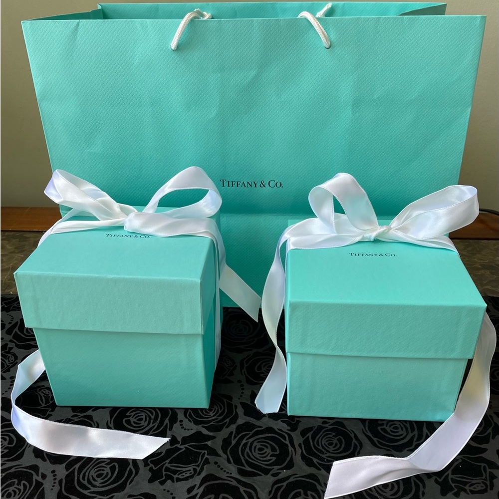Brand new in box set of 2 Tiffany Coffee Cups
in Bone China. MSRP $170